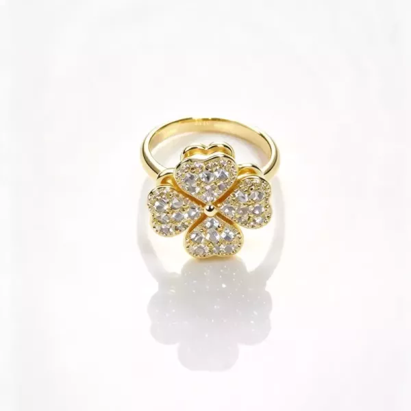 Bague trèfle pavée de zircons dorée