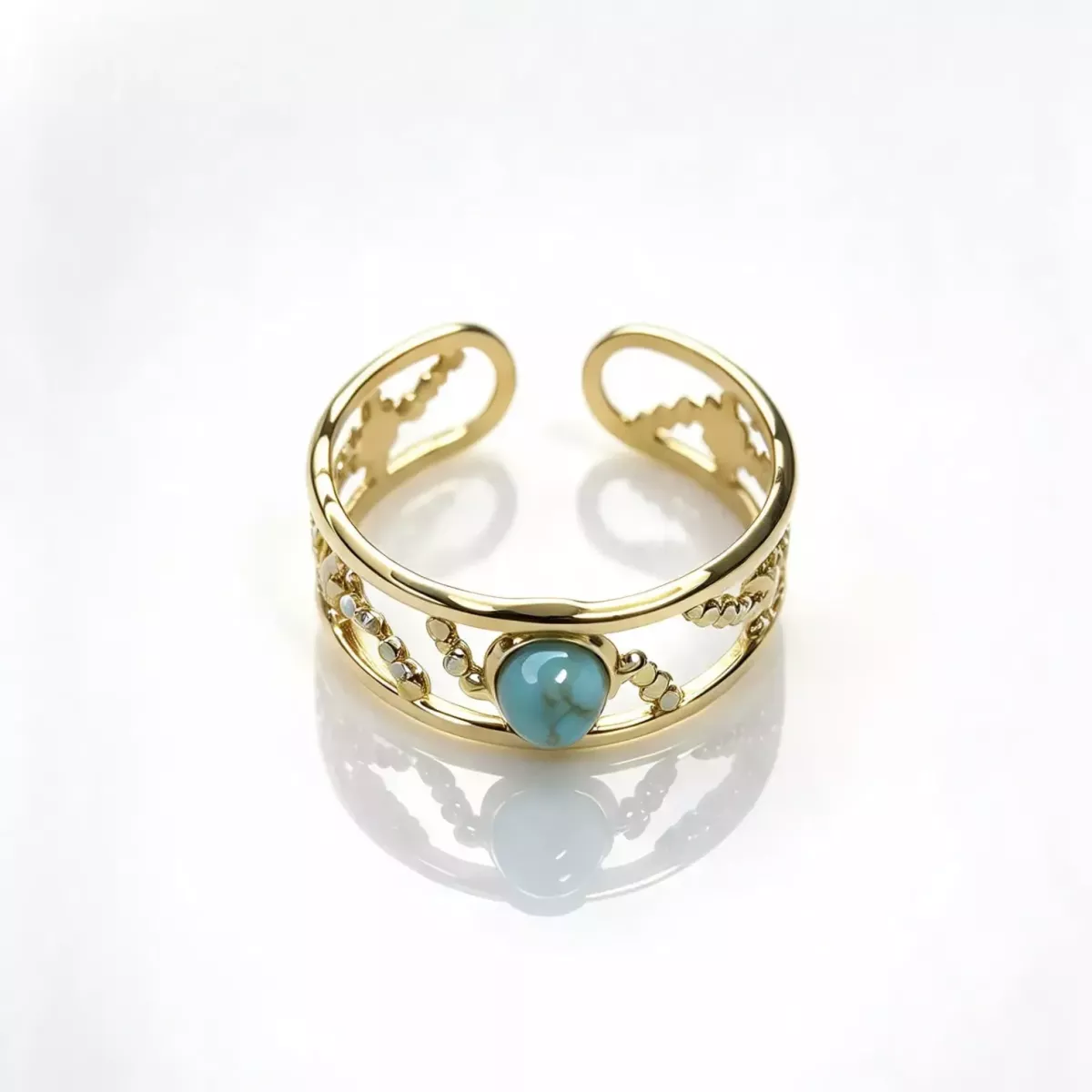 Bague ajustable ajourée pierre turquoise dorée