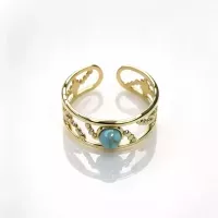 Bague ajustable ajourée pierre turquoise dorée