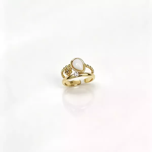 Bague fine goutte blanche et strass dorée