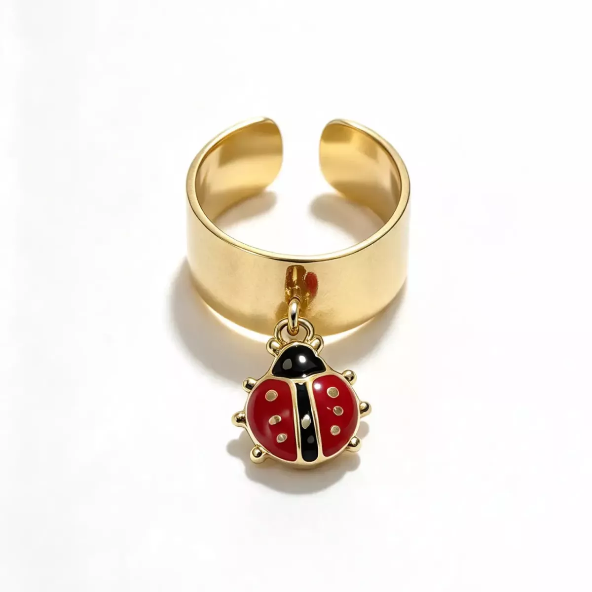 Bague ajustable pampille coccinelle dorée