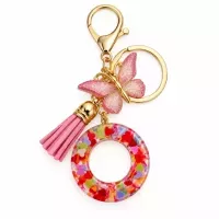 Porte-clés lettre O en résine paillettes cœurs multicolores