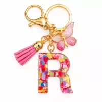 Porte-clés lettre R en résine paillettes cœurs multicolores