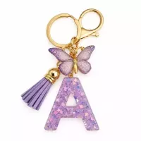 Porte-clés lettre A en résine paillettes violettes