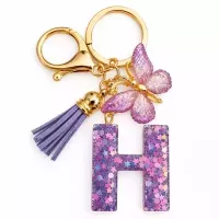 Porte-clés lettre H en résine paillettes violettes