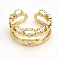 Bague ajustable ajourée cœurs et strass dorée