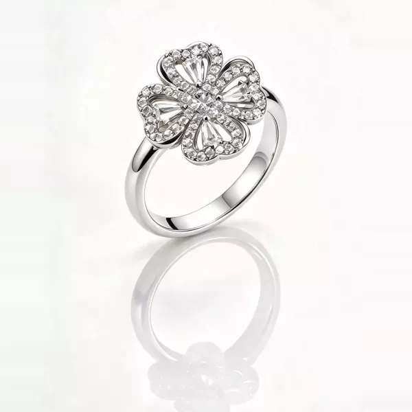 Bague fleur trèfle zircons et baguettes argentée