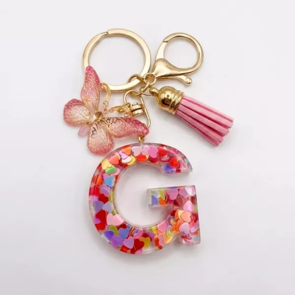 Porte-clés lettre G en résine paillettes cœurs multicolores