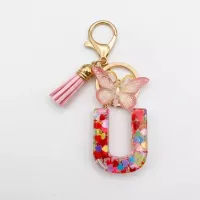 Porte-clés lettre U en résine paillettes cœurs multicolores