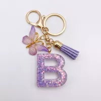 Porte-clés lettre B en résine paillettes violettes