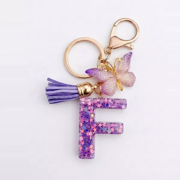 Porte-clés lettre F en résine paillettes violettes