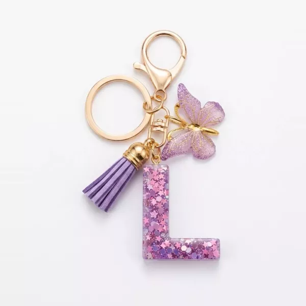 Porte-clés lettre L en résine paillettes violettes