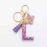 Porte-clés lettre L en résine paillettes violettes
