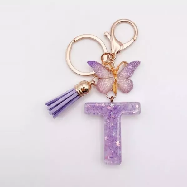 Porte-clés lettre T en résine paillettes violettes