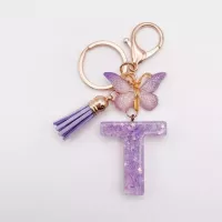 Porte-clés lettre T en résine paillettes violettes