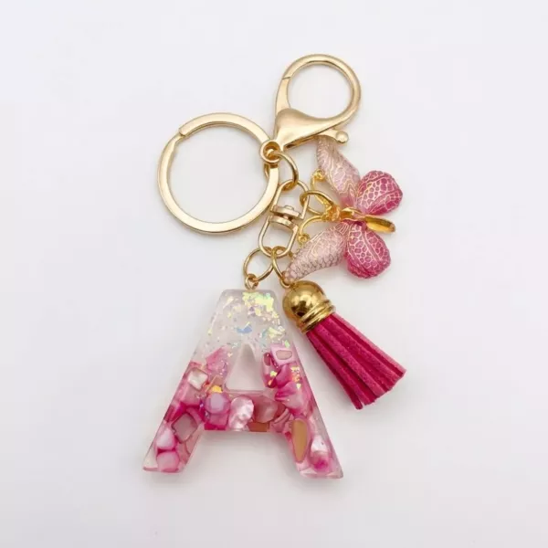 Porte-clés lettre A en résine éclats roses nacrés