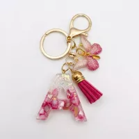 Porte-clés lettre A en résine éclats roses nacrés